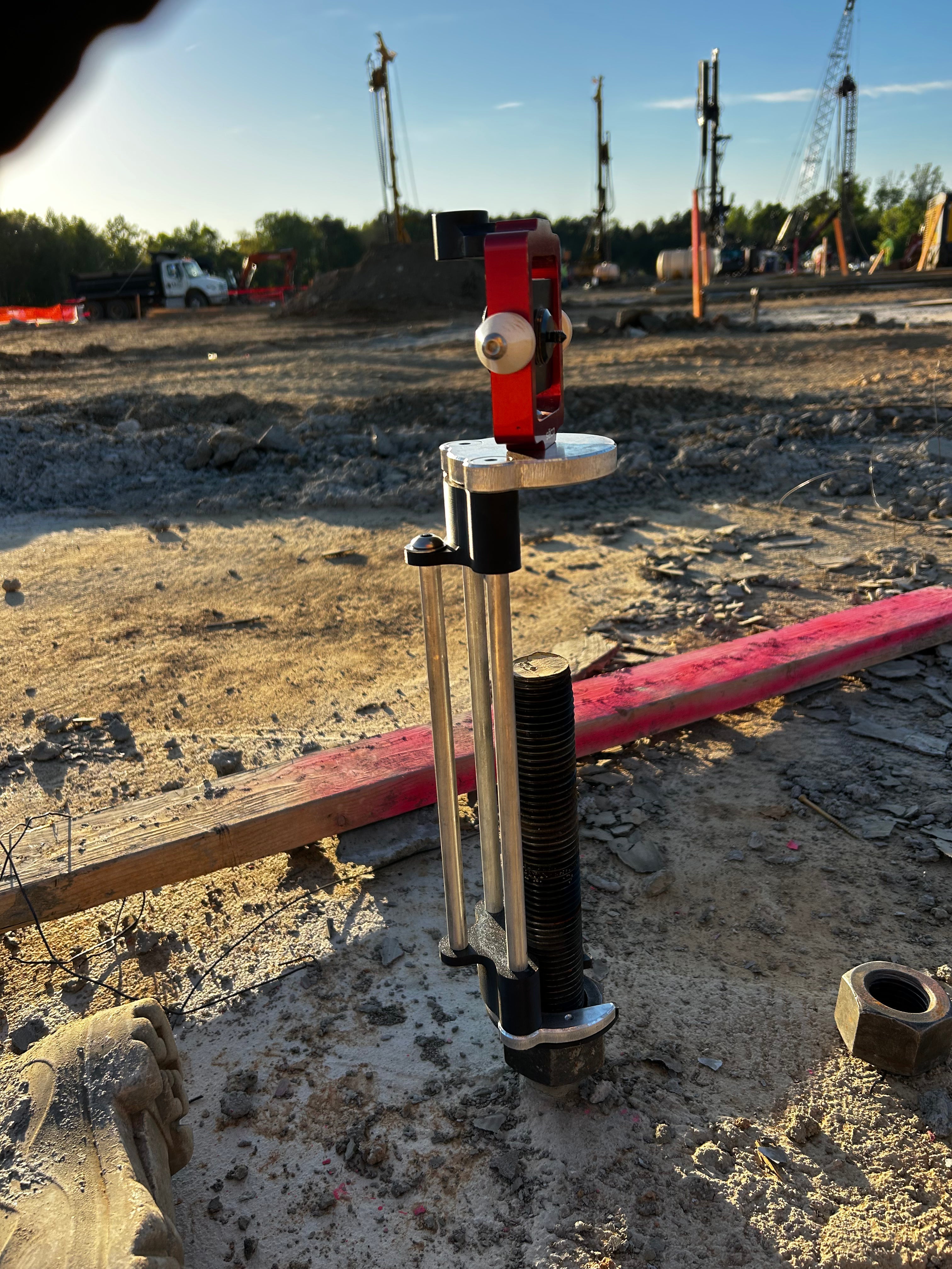 SDCJ-1  shown in it's daily environment, locating the absolute dead center of a large anchor bolt.