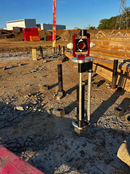 SDCJ-1  shown in it's daily environment, locating the absolute dead center of a large anchor bolt.